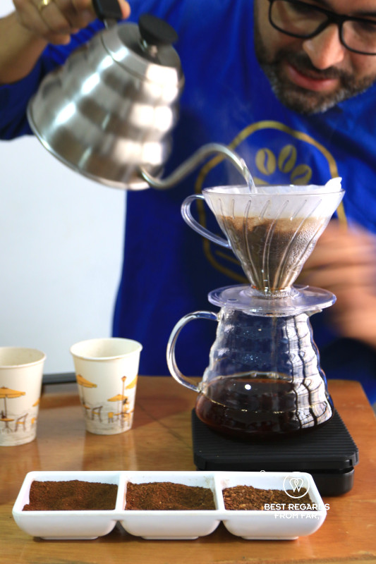 Leandro Galindo Giraldo brewing a specialty coffee.